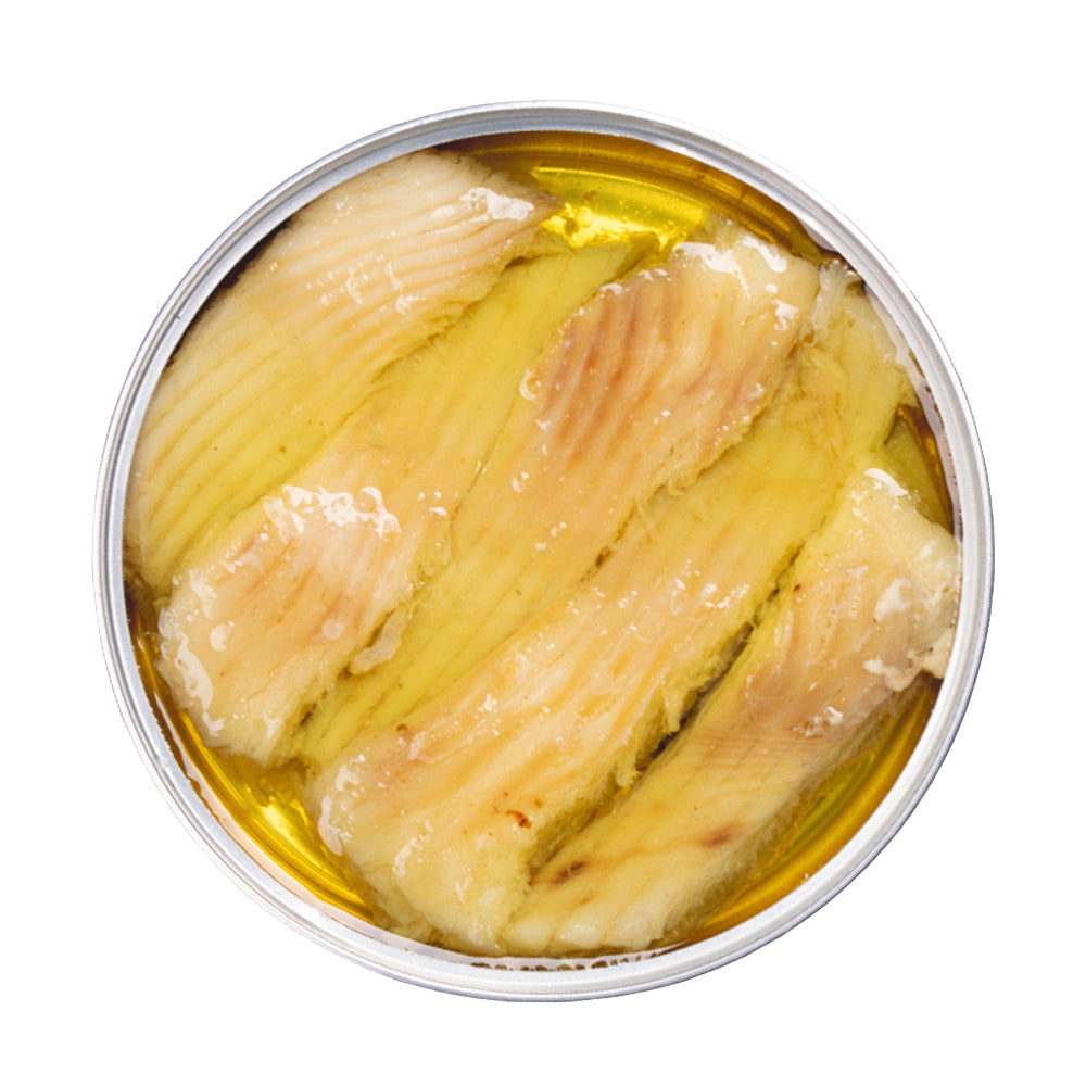 Ryba płaszczka w puszce z oliwą z oliwek i curry, otwarta puszka | ABC+